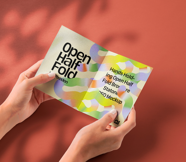 Hand Holding Psd Half Fold Brochure Mockup 